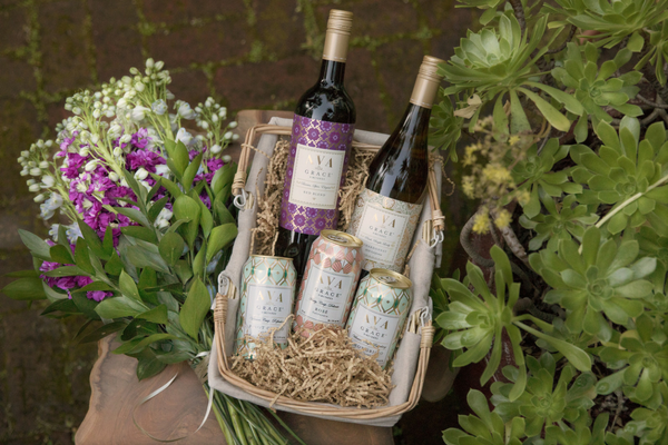 Mother's Day Wine Gifts of a flower bouquet and a wine gift basket