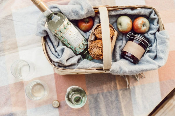 An indoor picnic spread with AVA Grace Pinot Grigio
