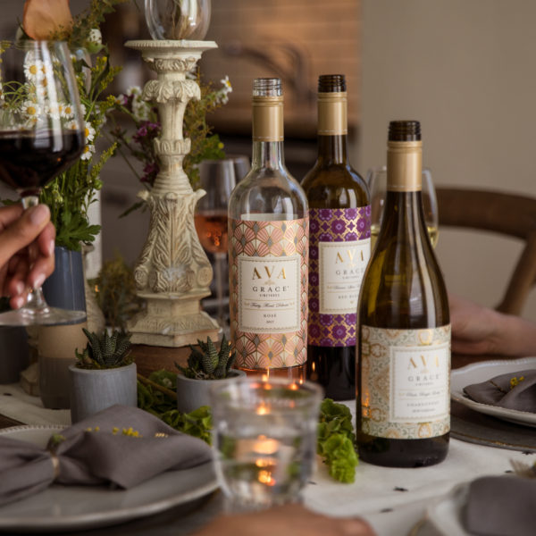 The Best Thanksgiving Food and Wine Pairings from AVA Grace, Wine bottles on a thanksgiving table