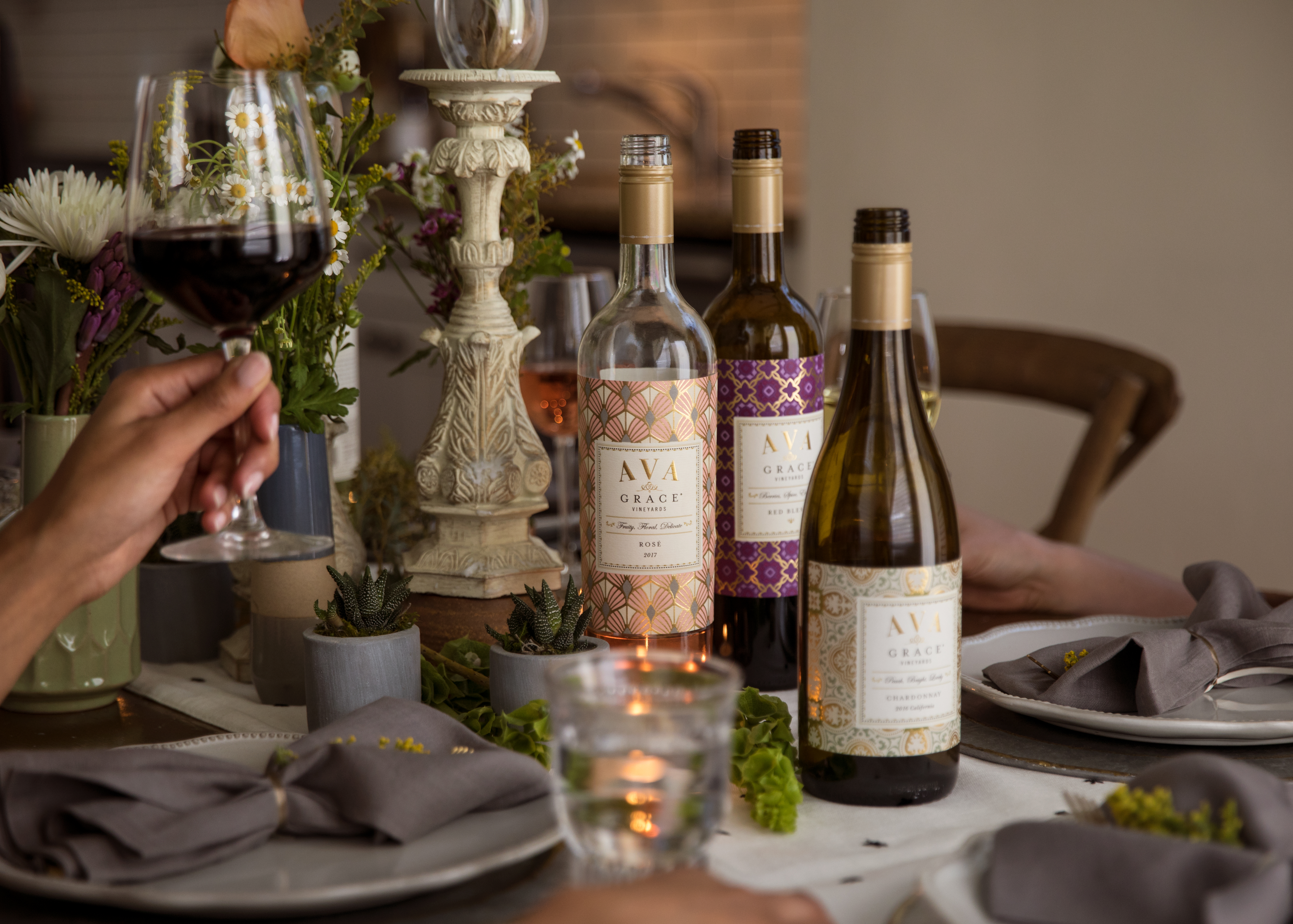 The Best Thanksgiving Food and Wine Pairings from AVA Grace, Wine bottles on a thanksgiving table