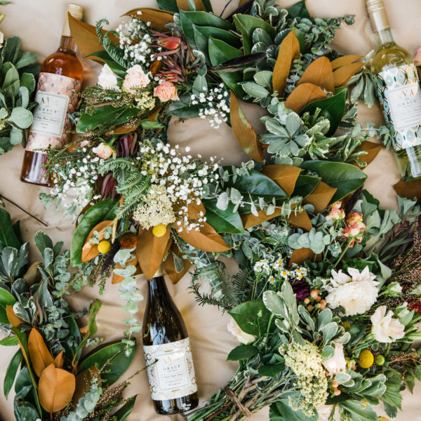 Wreaths with AVA Grace wine bottles