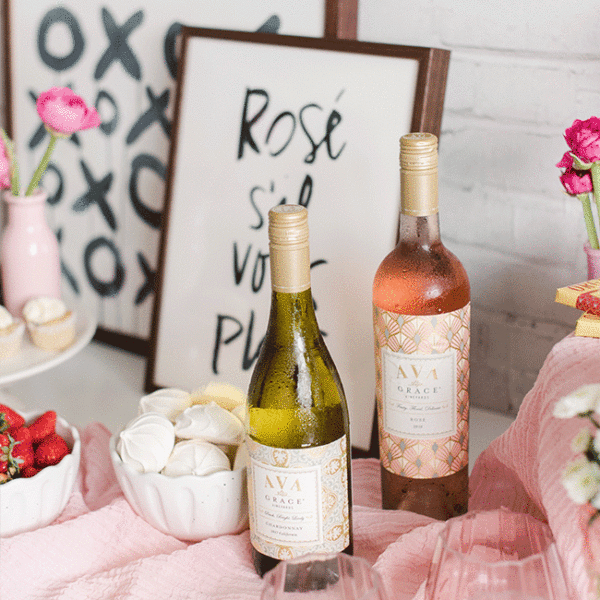 Valentine's Day gifts (a bottle of AVA Grace Chardonnay and a bottle of AVA Grace Rose) sitting on a table