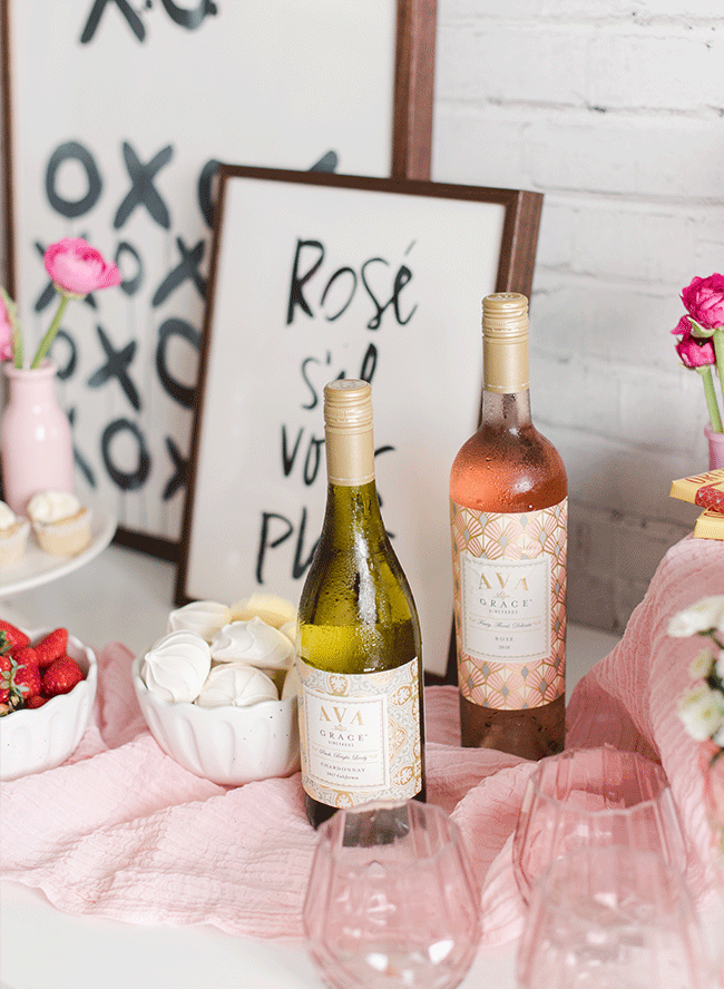 Valentine's Day gifts (a bottle of AVA Grace Chardonnay and a bottle of AVA Grace Rose) sitting on a table